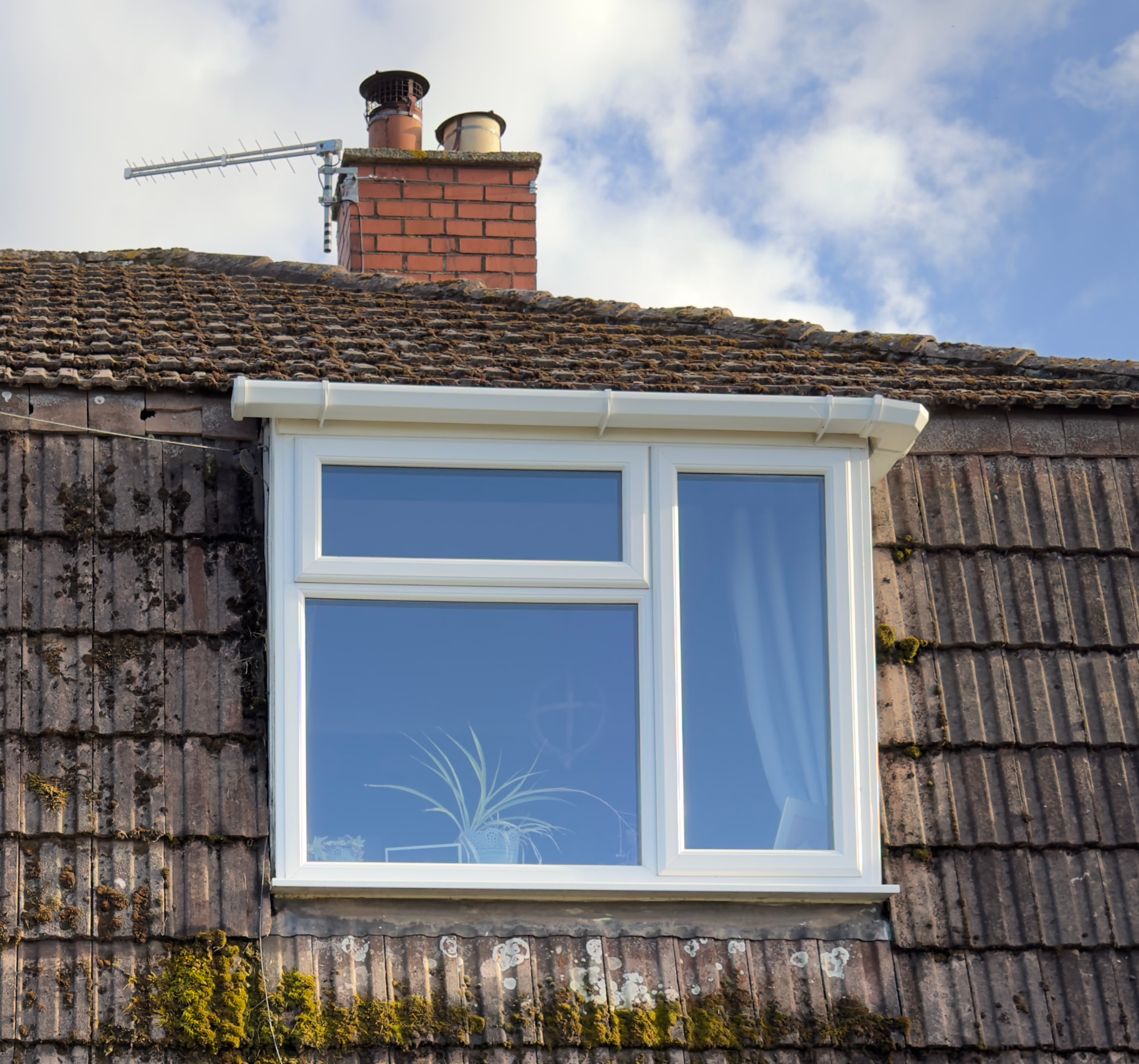 Window, gutters and fascias after exterior cleaning by OutWash
